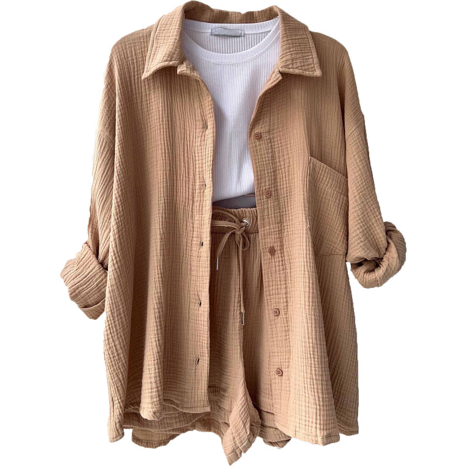 A two-piece set of wrinkled fabric shirt and high-waisted shorts